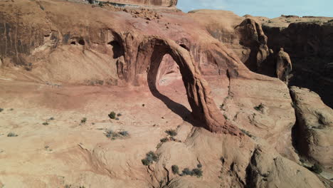 aerial drone views of corona arch, west of moab, utah