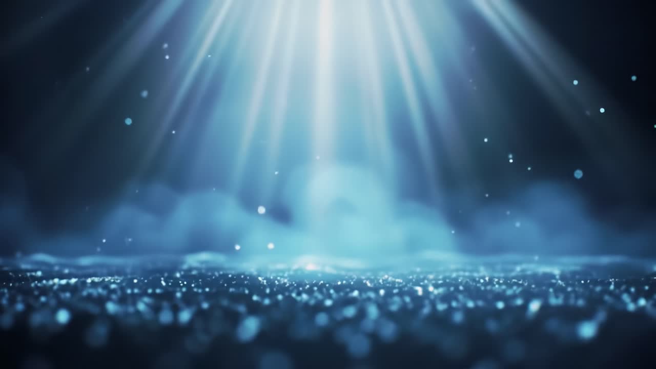 Soft light rays penetrate the tranquil water, creating a mesmerizing display of sparkling reflections. This serene underwater moment captures the beauty of nature at its finest.