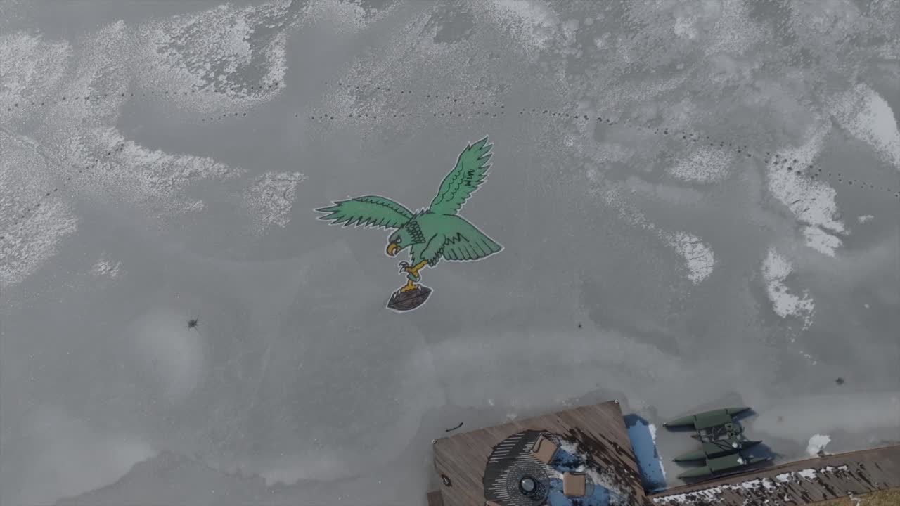 Eagles Logo on Frozen Ice, Perfect for Winter Sports Videos