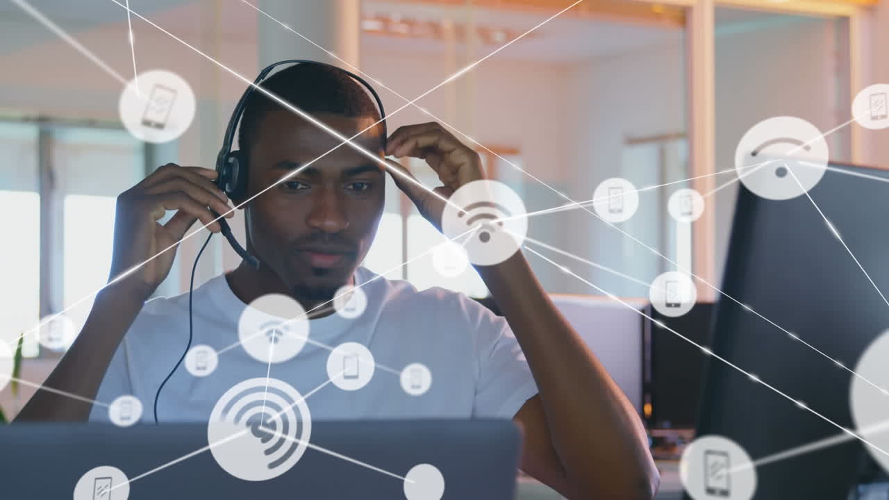 Animation of networks of connections and businessman wearing phone headset