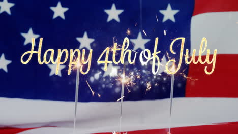 feliz 4 de julio texto y una bandera estadounidense con chispas en cupcakes