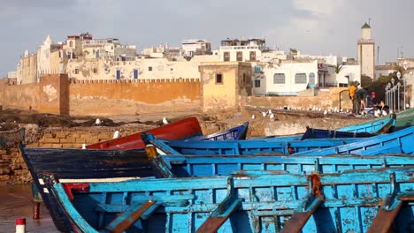 View-of-the-seaside-of-Essaouira,-Morocco-with-crenelated-wall-on-sunny-day