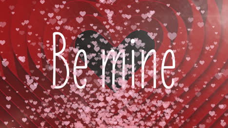 be mine text with hearts on black background