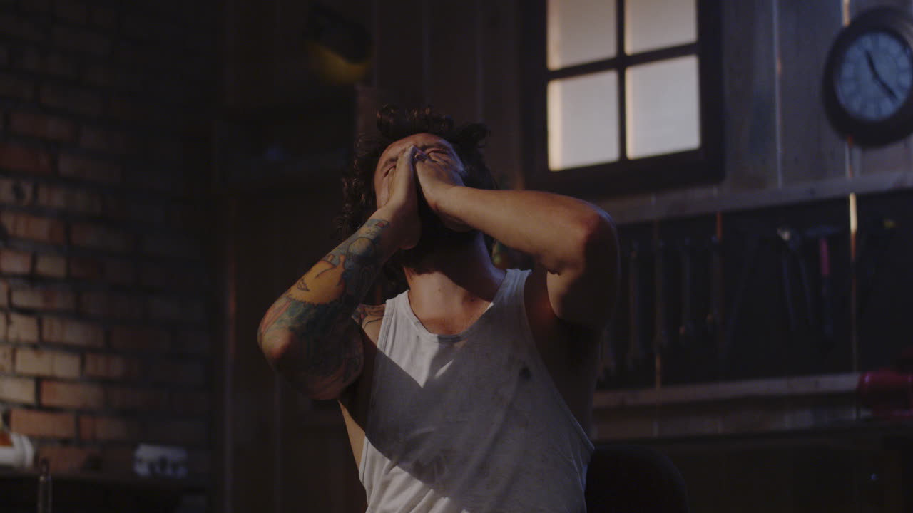 Frustrated Man in a Workshop