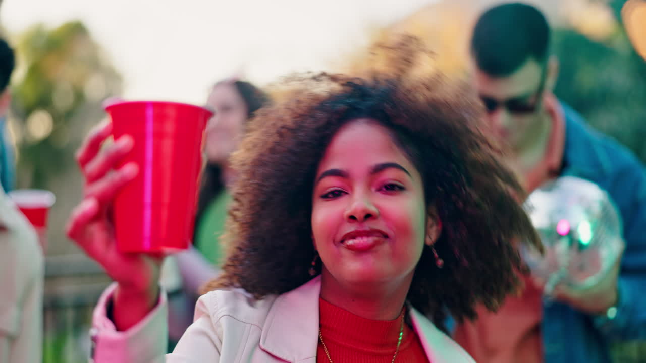 Friends Enjoying a Fun Party with Dancing and Red Cups