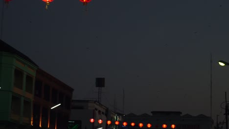 red lanterns at night in an asian city
