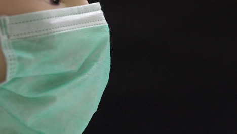 health mask that protects against spray mist in the air on a black background.