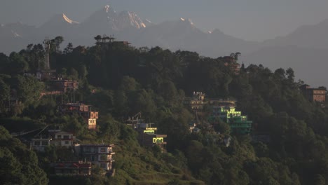 sunrise view of a village nestled in the mountains