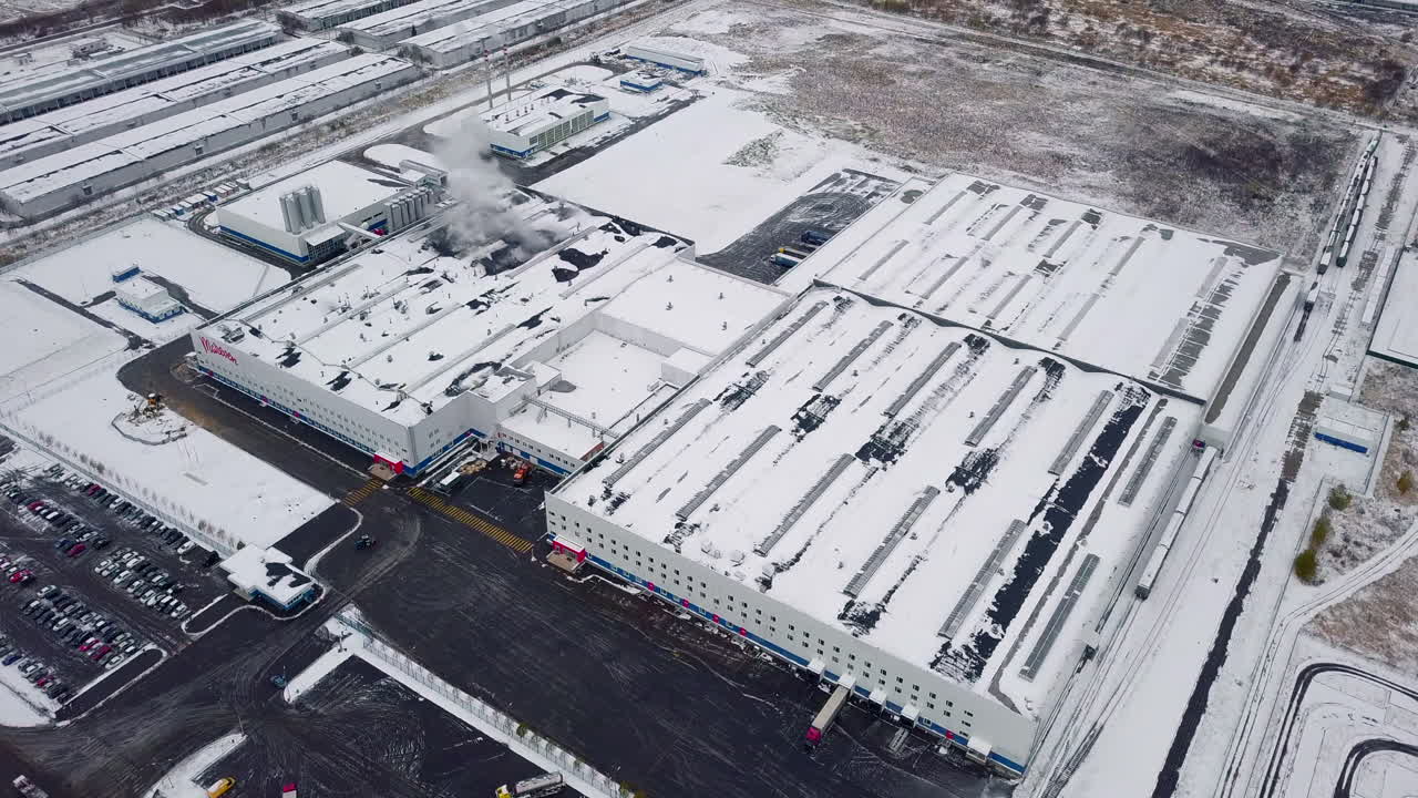 Aerial View of a Snow-Covered Industrial Complex