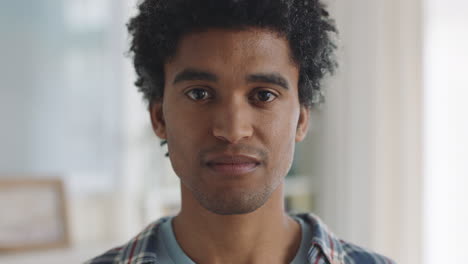 portrait happy mixed race man smiling enjoying successful lifestyle healthy man at home looking confident