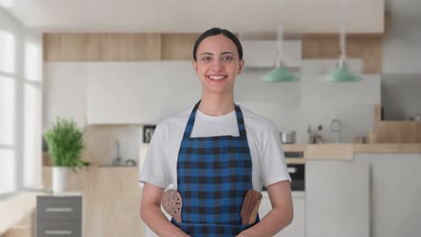 Happy-Indian-housewife-smiling-to-the-camera