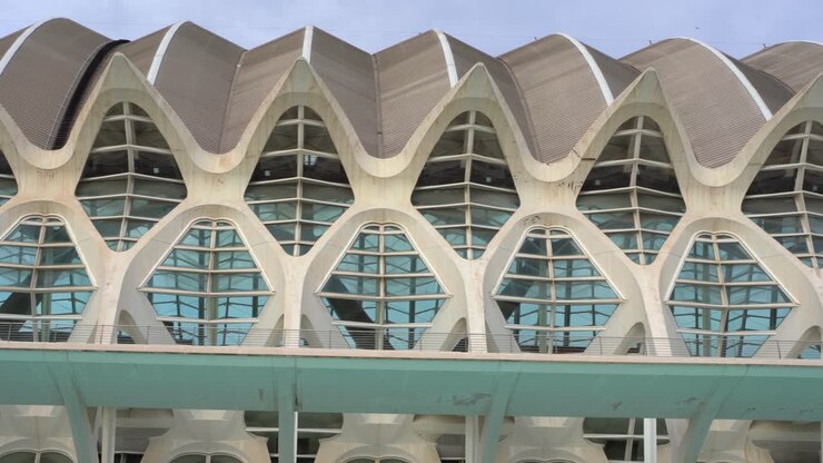 Modern City of Arts and Science Building in Valencia City during sunny day, Spain - panorama panning shot