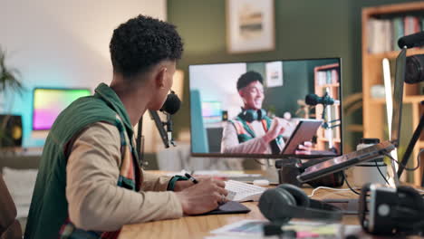 man working on computer at home