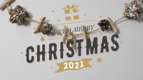 Animation-Des-Textes-„Frohe-Weihnachten“-über-Weihnachtsdekorationen