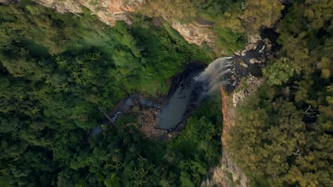Purling-Brook-Falls-filmed-with-a-Drone,-vertical-shot,-Australia