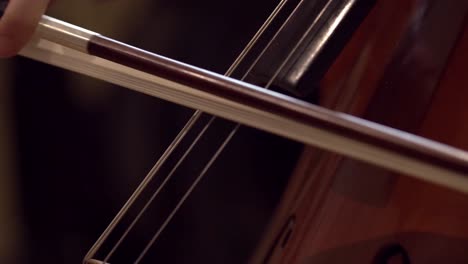 close up of cello being played