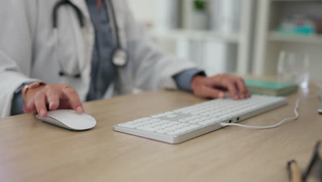 woman, doctor and hands typing on computer