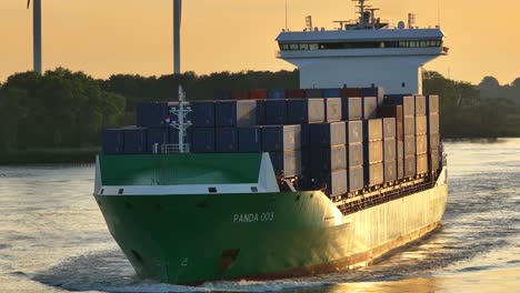 container ship panda 003 sailing at golden hour