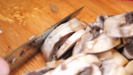 sliced mushrooms on cutting board