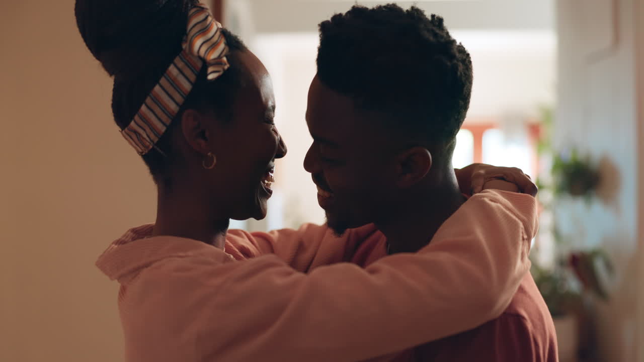Hug, love and African couple in home for bonding