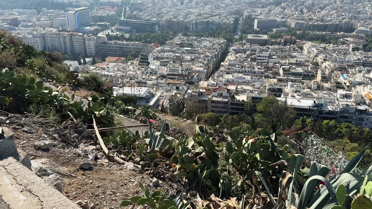 Climbing Lycabettus Hill, overlooking the stunning panorama of Athens below.