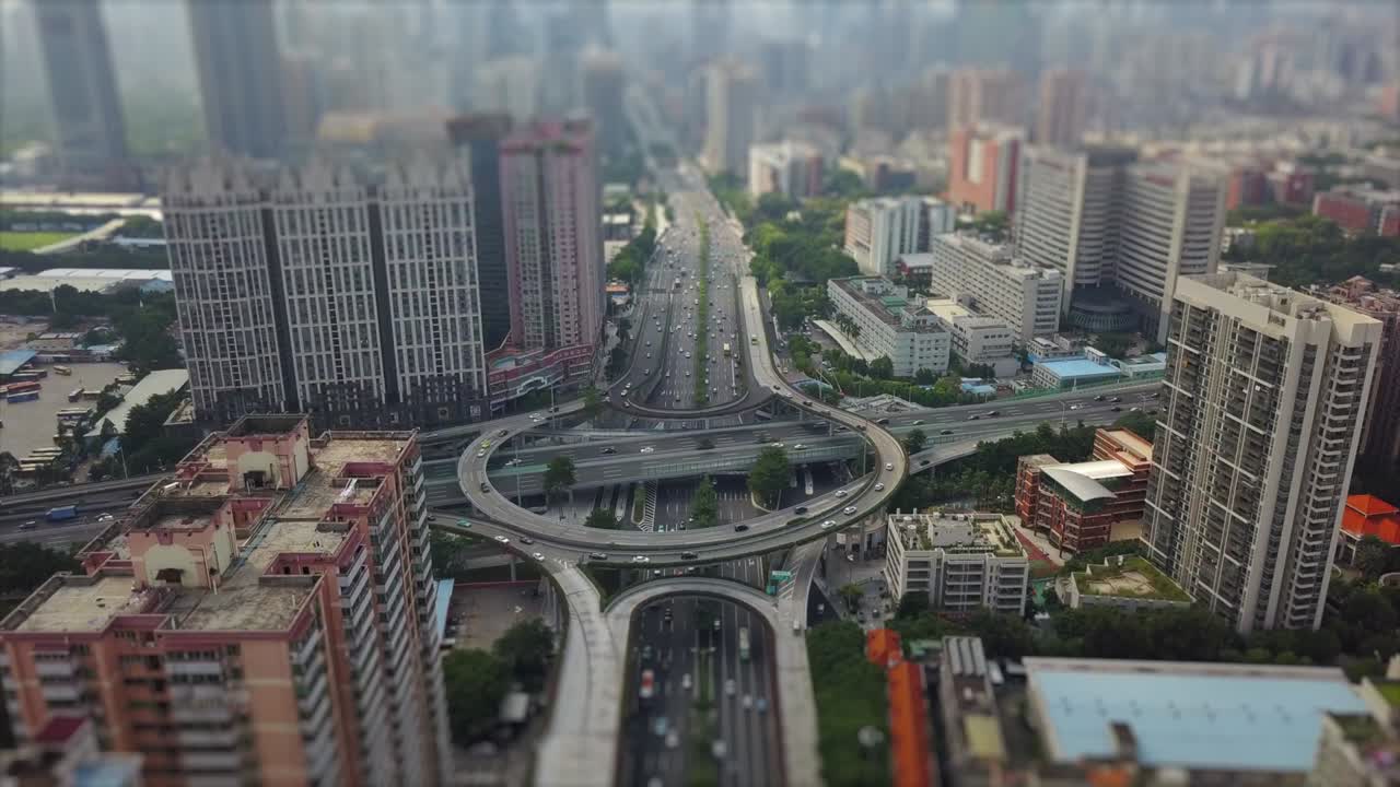 day time guangzhou cityscape traffic road junction aerial panorama tilt-shift 4k china