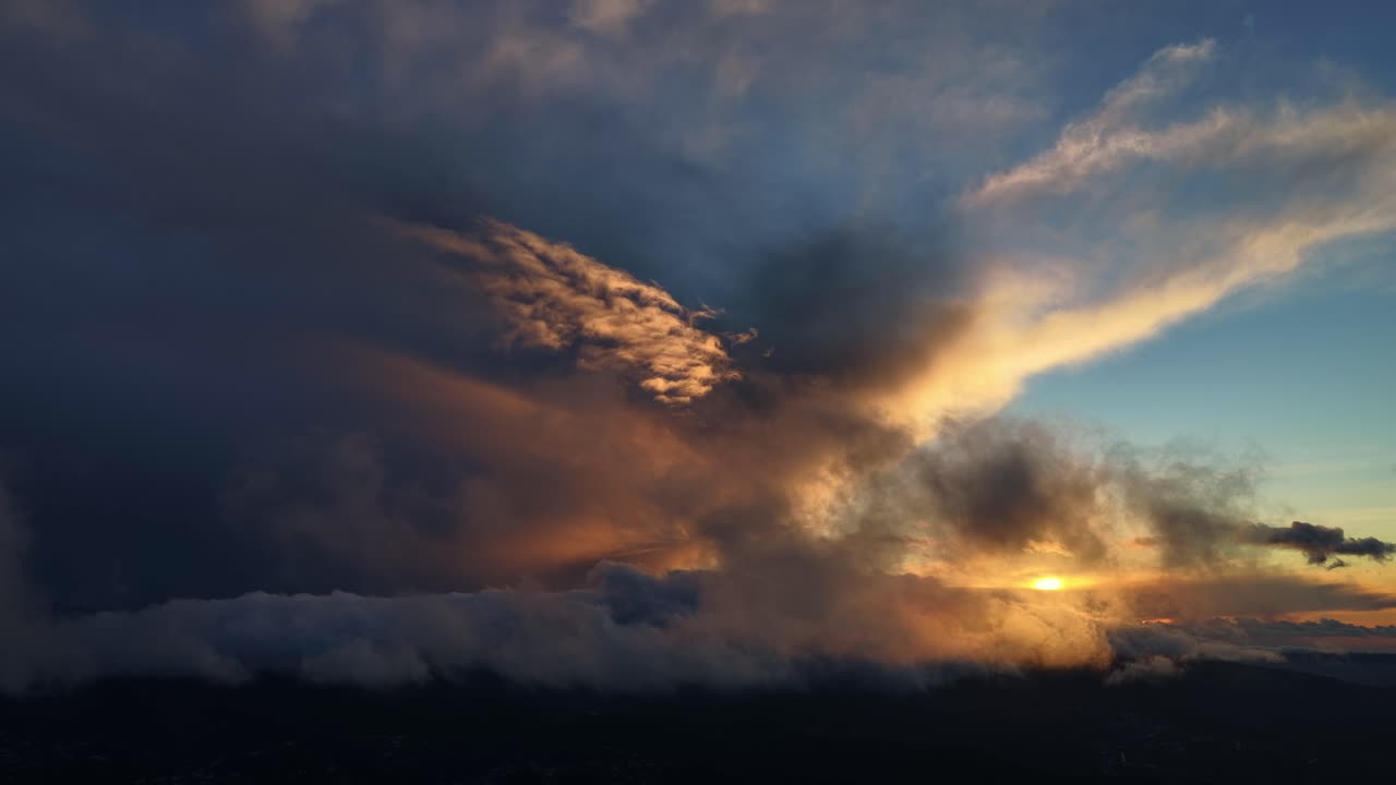 Sunset on the clouds aerial view