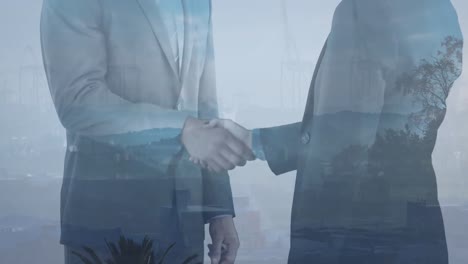 Animation-of-businessman-handshake-over-cityscape