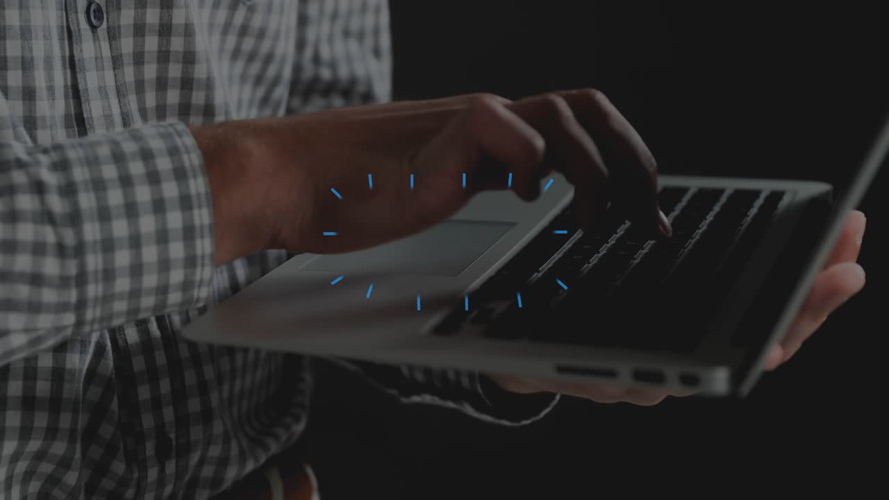 Man typing on laptop, causing vivid shapes, dashes clustering keys, bursting trackpad, showing tech