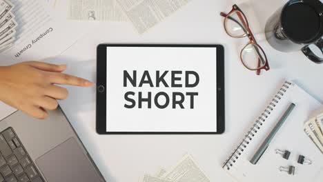 naked short displaying on a tablet screen