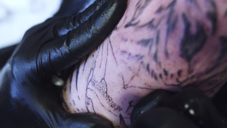 beautiful close-up slow motion detail of the tattooing