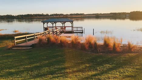 serene lakeside gazebo at sunset