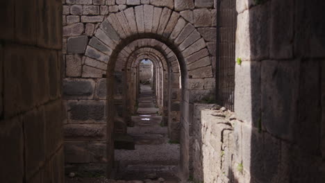 looking directly down a stone hallway in pergamum