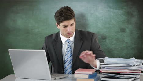 Worried-businessman-using-laptop