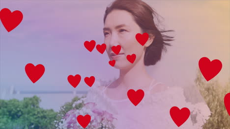 holding bouquet outdoors, woman with red hearts animation around her