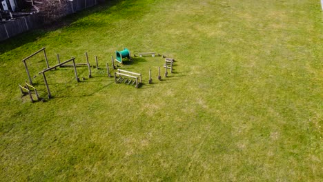 a view from above of a children's play area surrounded by a calm suburb