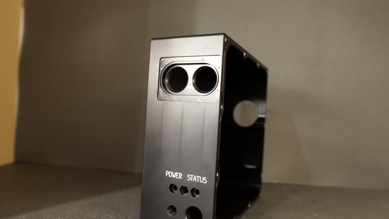 Precision CNC machined metal housing for an industrial sensor unit. Engineered enclosure component used in automation and control systems