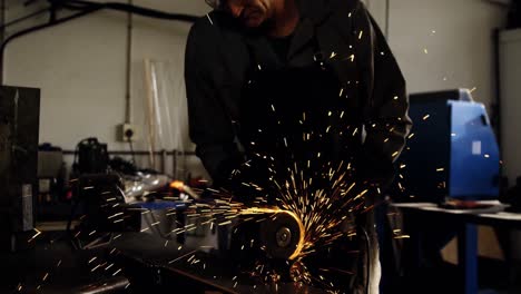 welder working at work shop