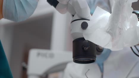 medical procedure with microscope