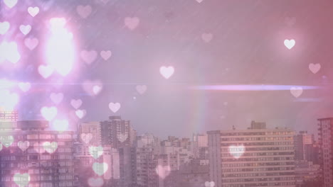 tall city buildings filled with hearts