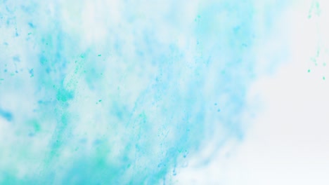 turquoise and blue ink in water