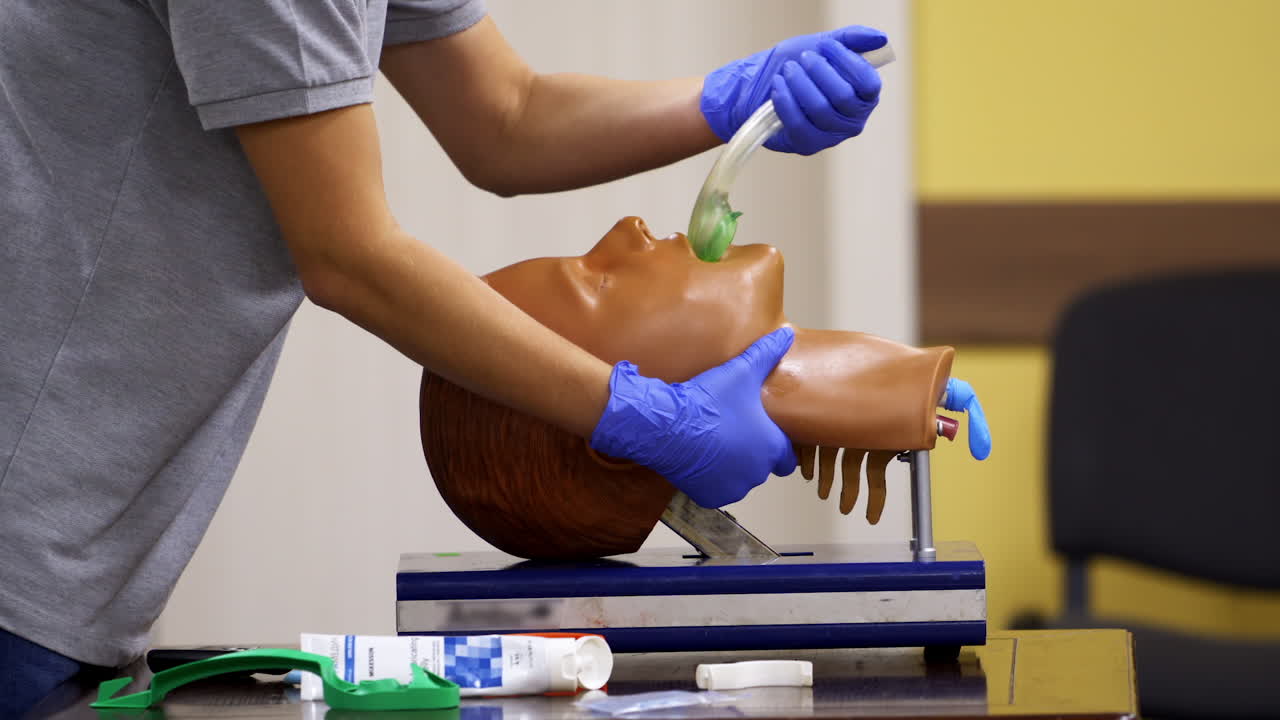 Mannequin and intubation set for advance cardiac life support training. Video from first aid courses.