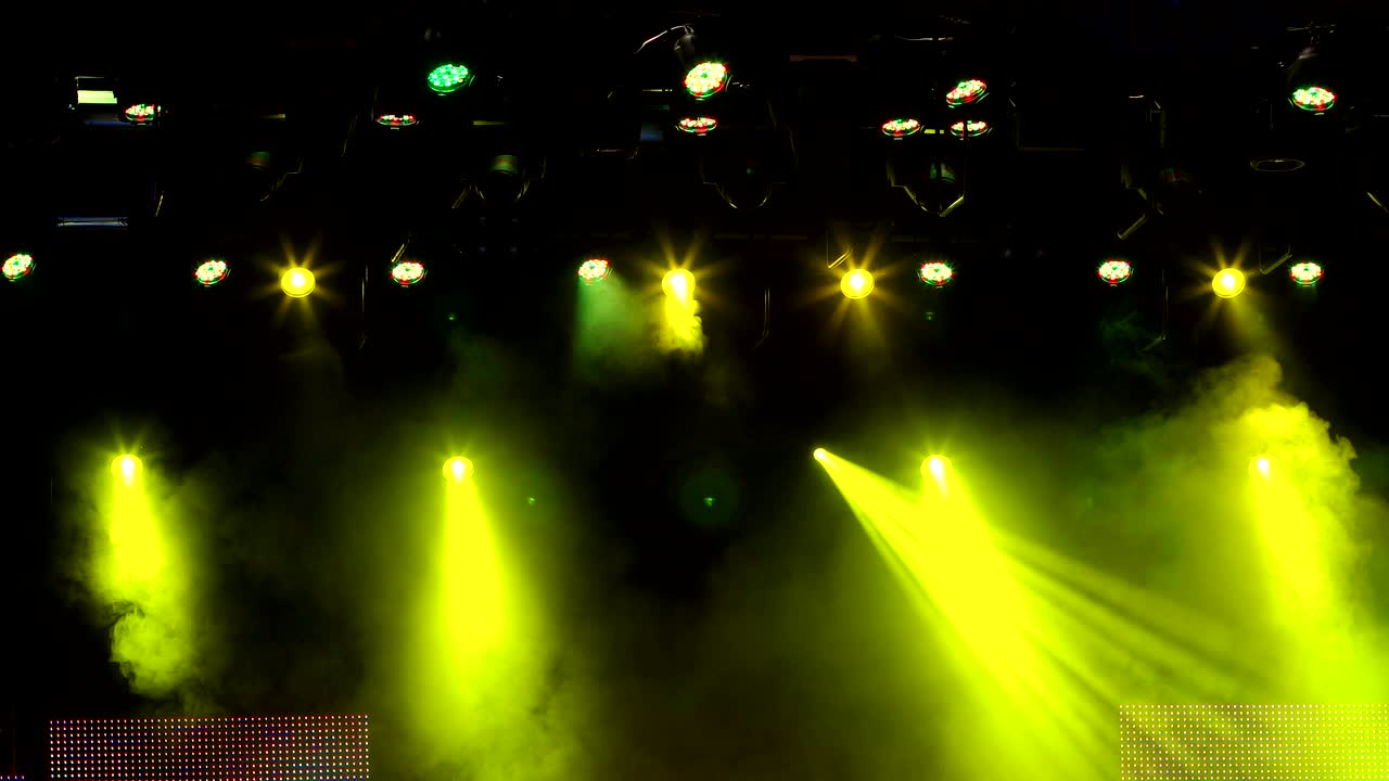 Shimmering colored lights on stage.