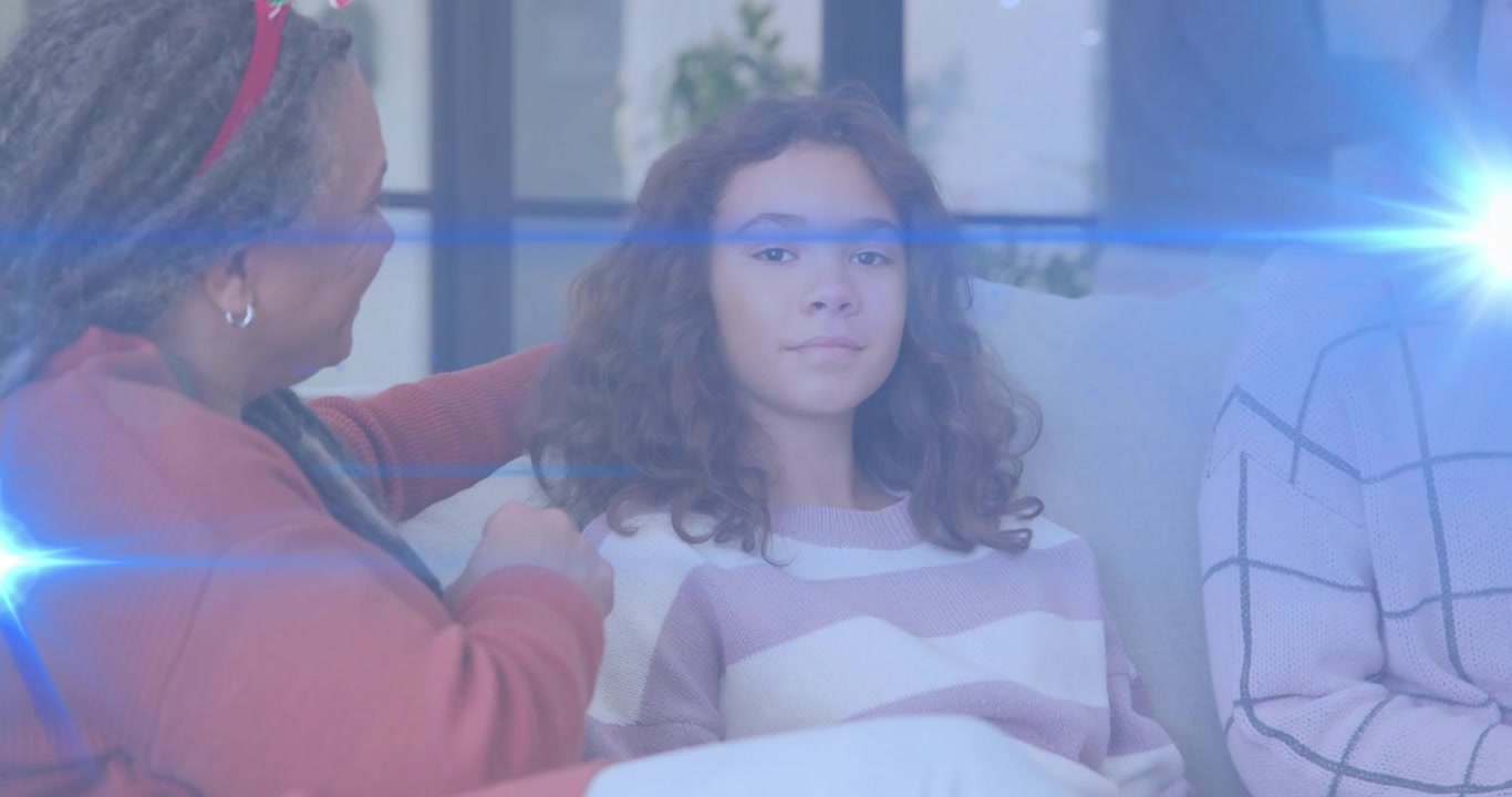 Grandma entering behind girl comforting her while mother observing near Christmas tree for health