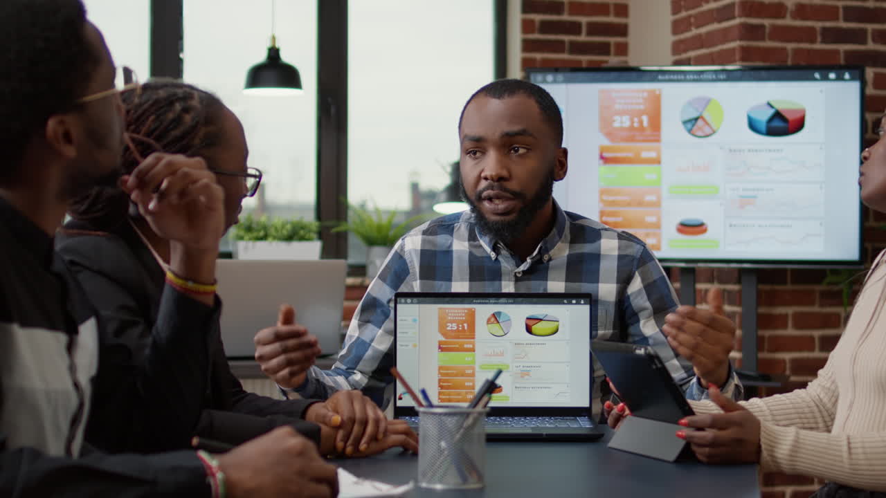African american startup company brainstorming ideas to plan analysis