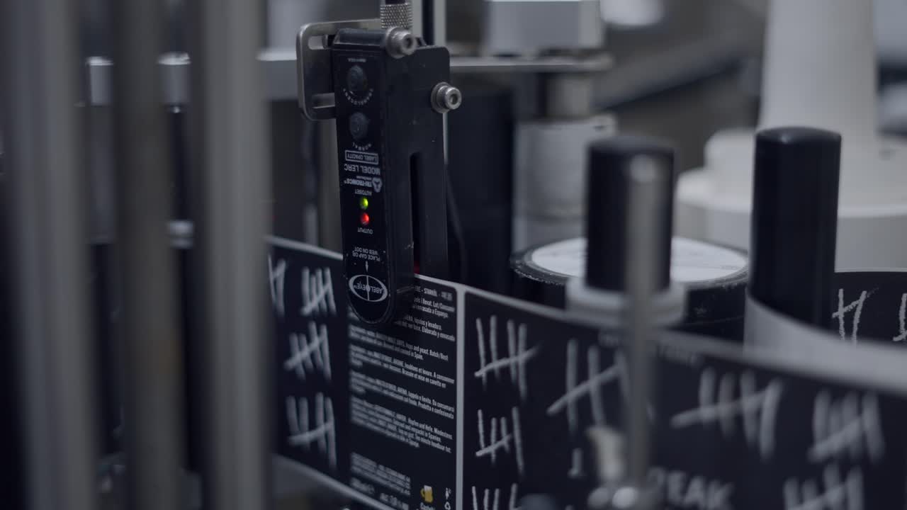 Automated Labeling Machine in a Factory
