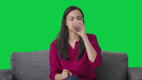 indian woman having vomit after taking medicine green screen