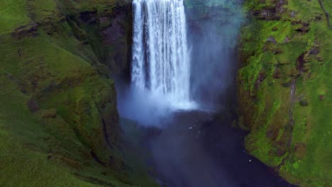 Scenic-View-Of-Skogafoss-Waterfall-At-Skogar-Village,-South-Iceland---aerial-drone-shot