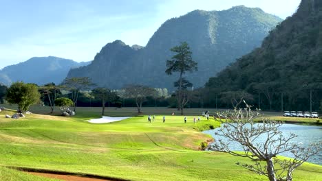 golfers enjoy a sunny day in thailand