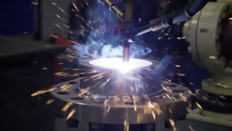 captivating process of precision welding: observing the intricate sparks and glow emitted during advanced metal joining techniques in a controlled environment